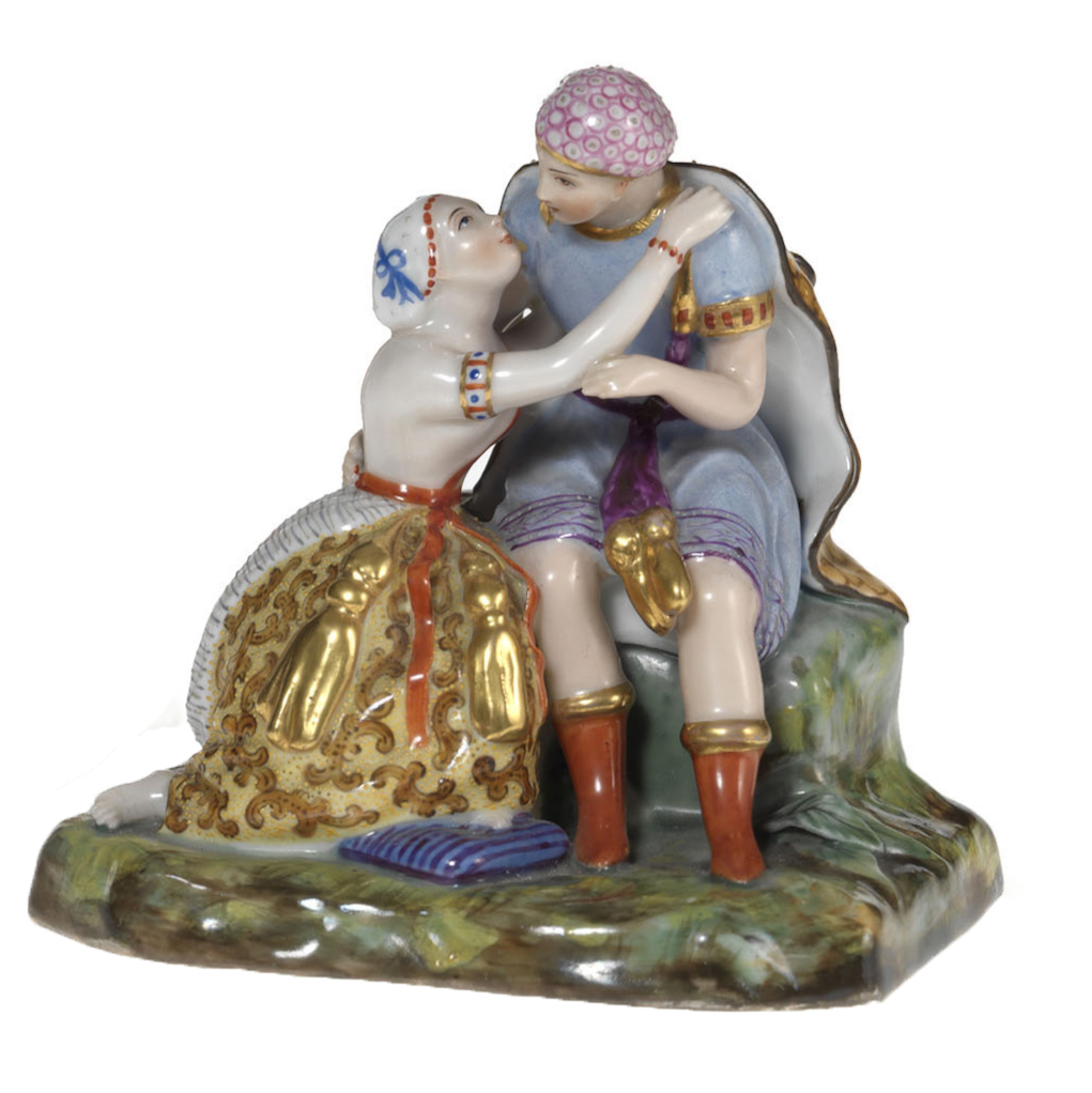 A Porcelain Group of a Couple Embracing