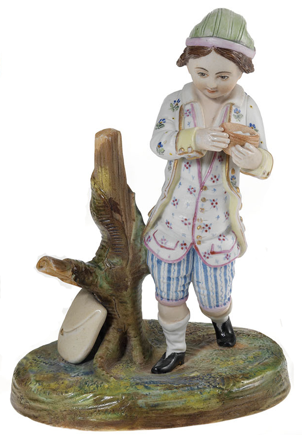 A Biscuit Porcelain Figurine of a Child