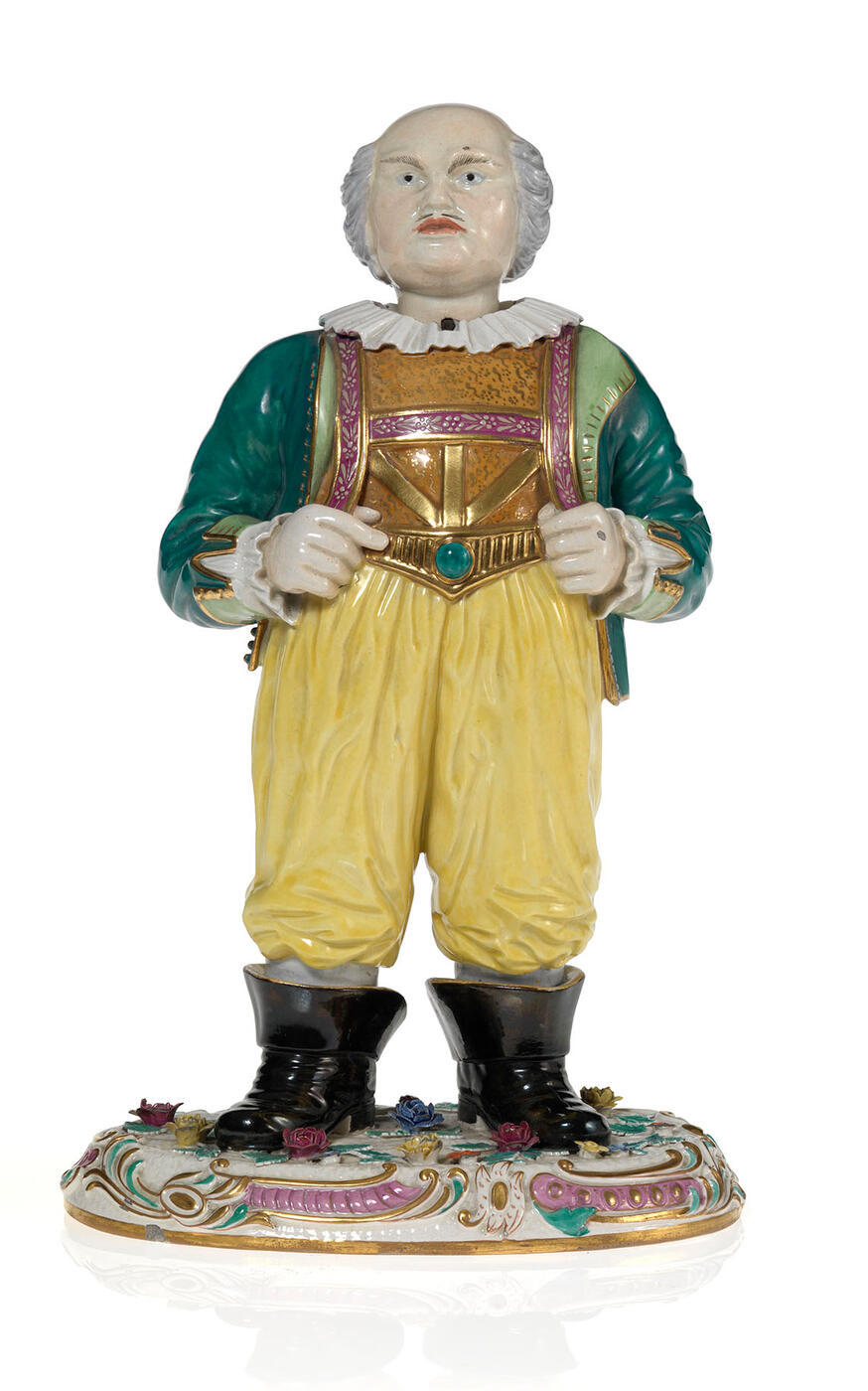 An Articulated Faience Figurine of a Jester