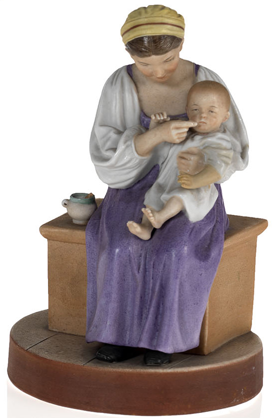 A Biscuit Porcelain Figurine of a Seated Peasant Mother and Child