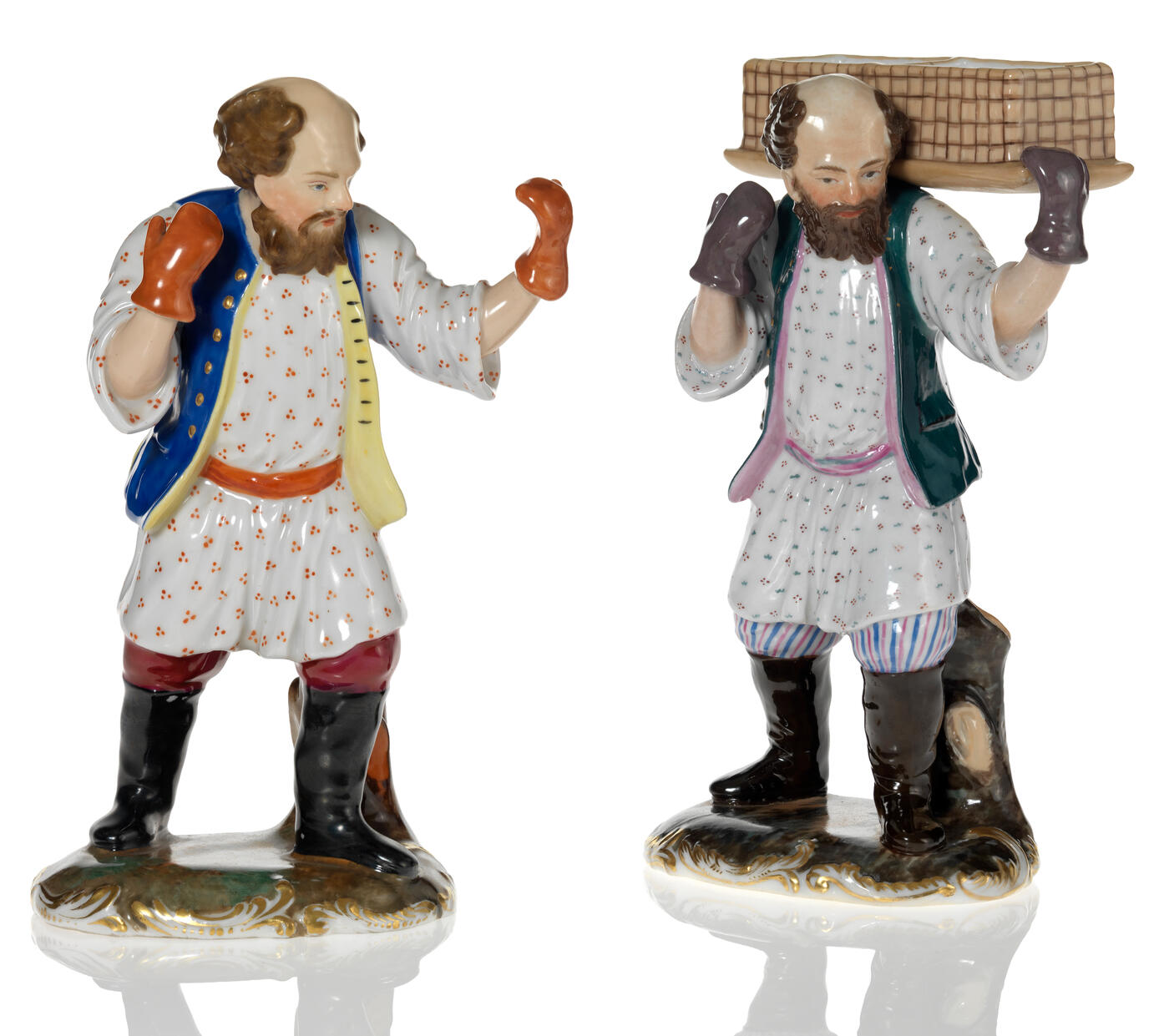 Two Porcelain Figurines of Peasants