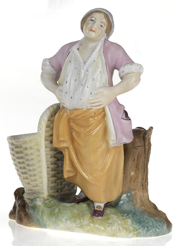 A Biscuit Porcelain Figurine of a Washerwoman