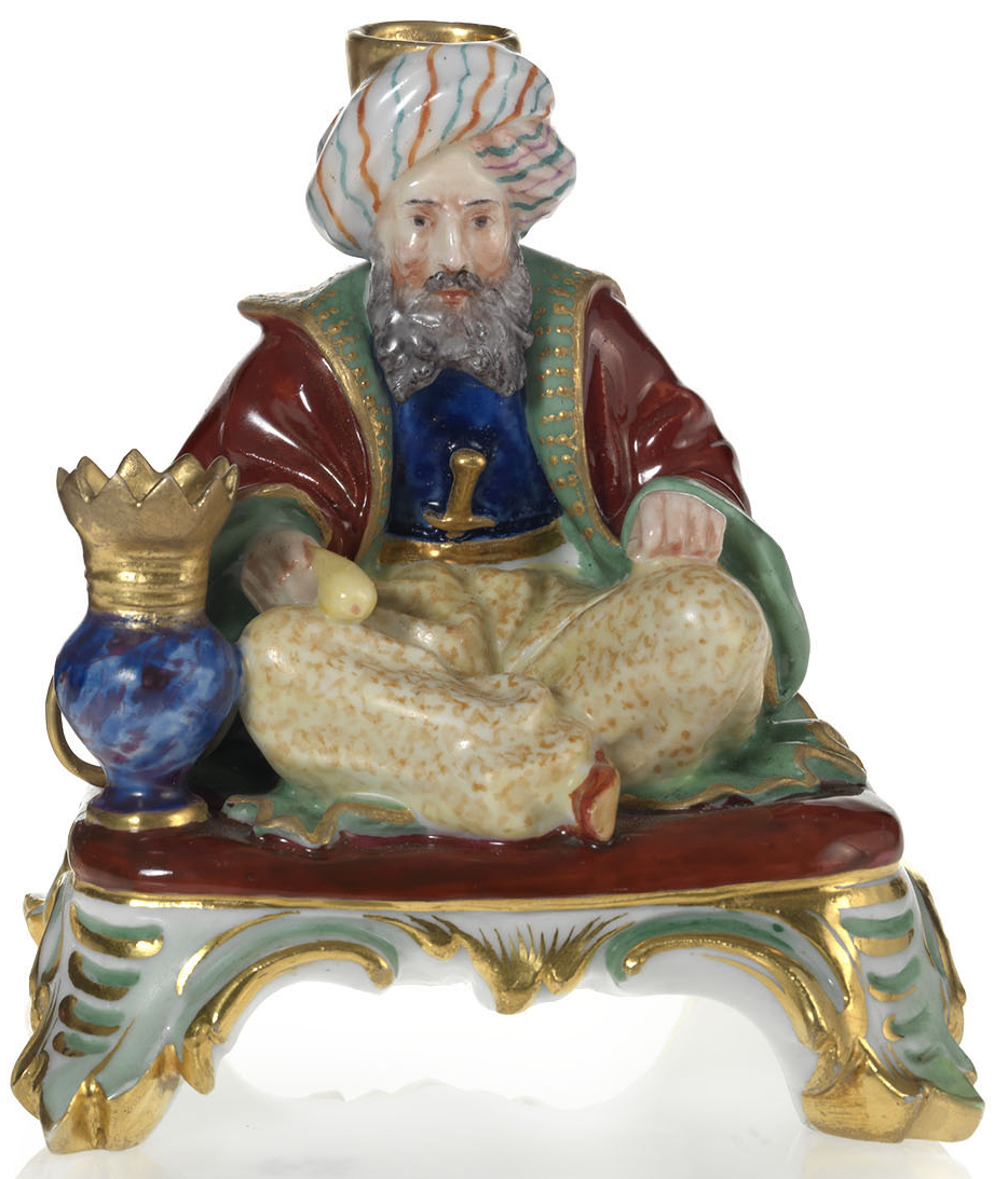 A Porcelain Penholder in the Form of a Seated Pipe Smoker