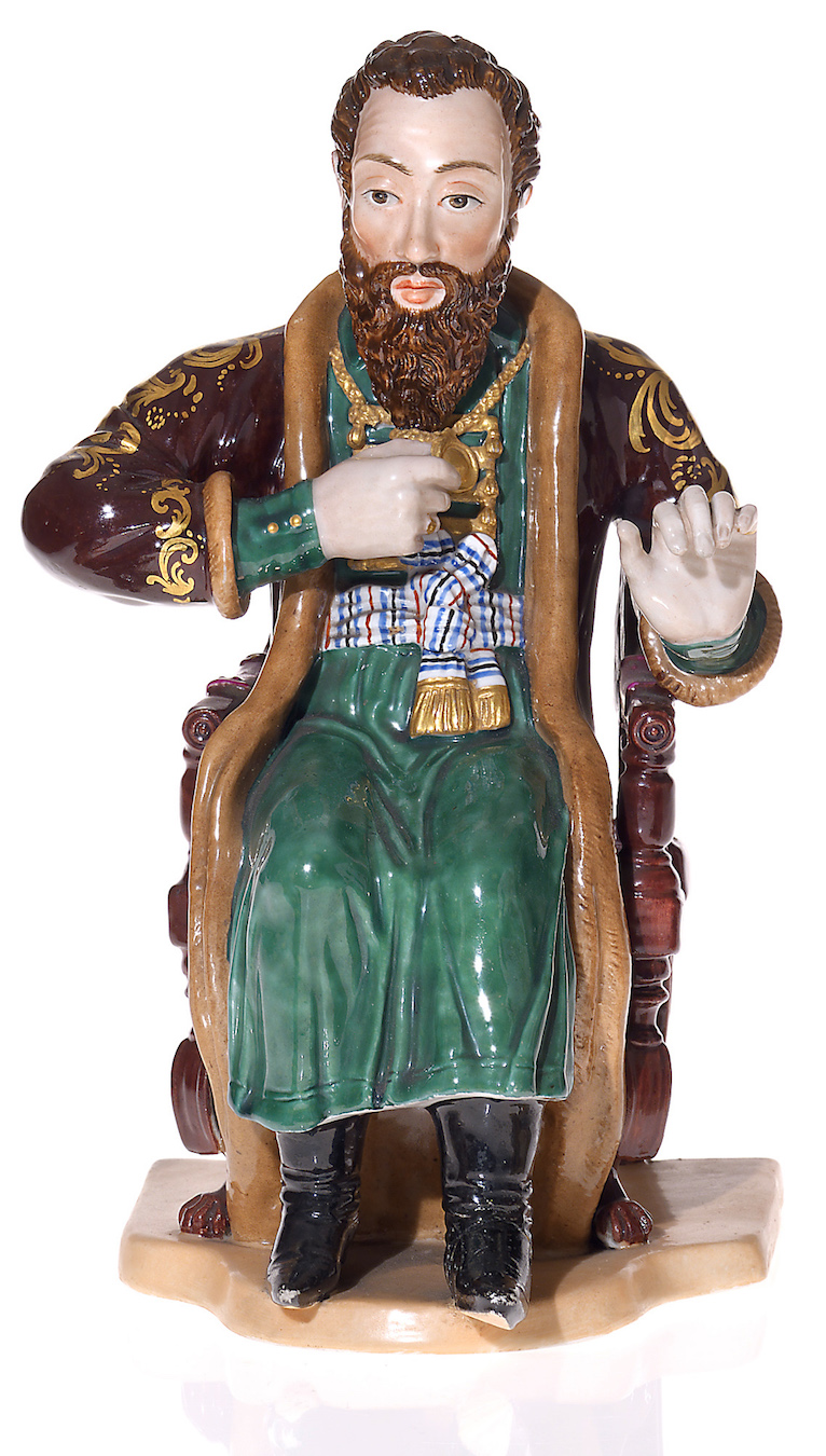 A Rare Large Russian Porcelain Figurine of a Draughts Player