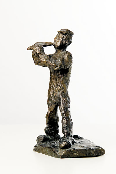 A Bronze Figure of a Boy with a Flute