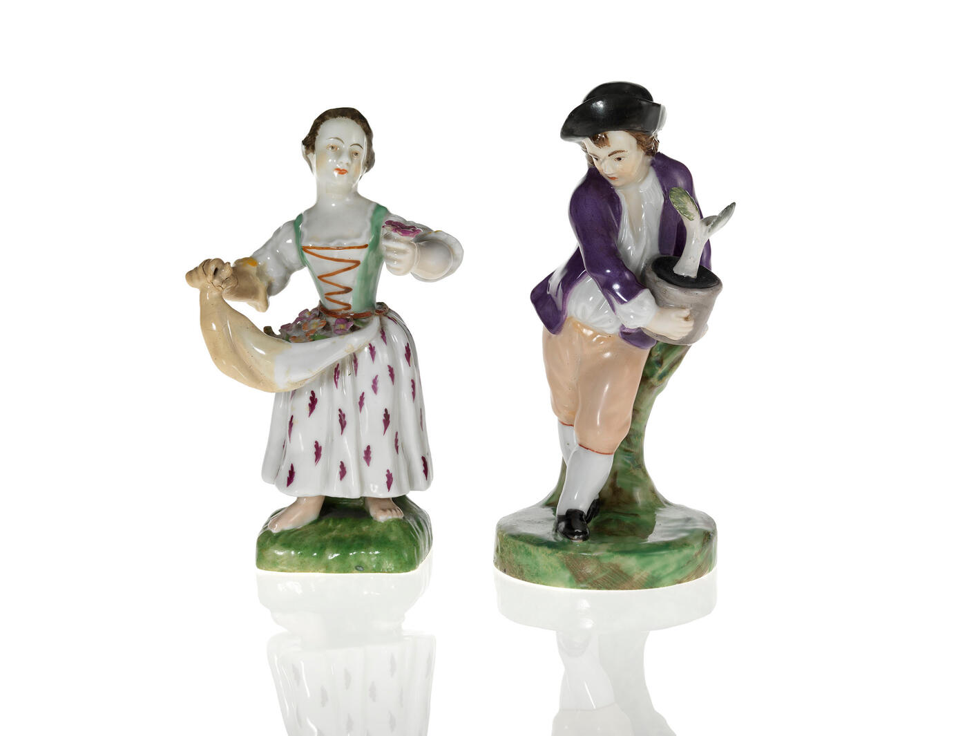 Two Porcelain Figurines of a Flower Girl and Boy