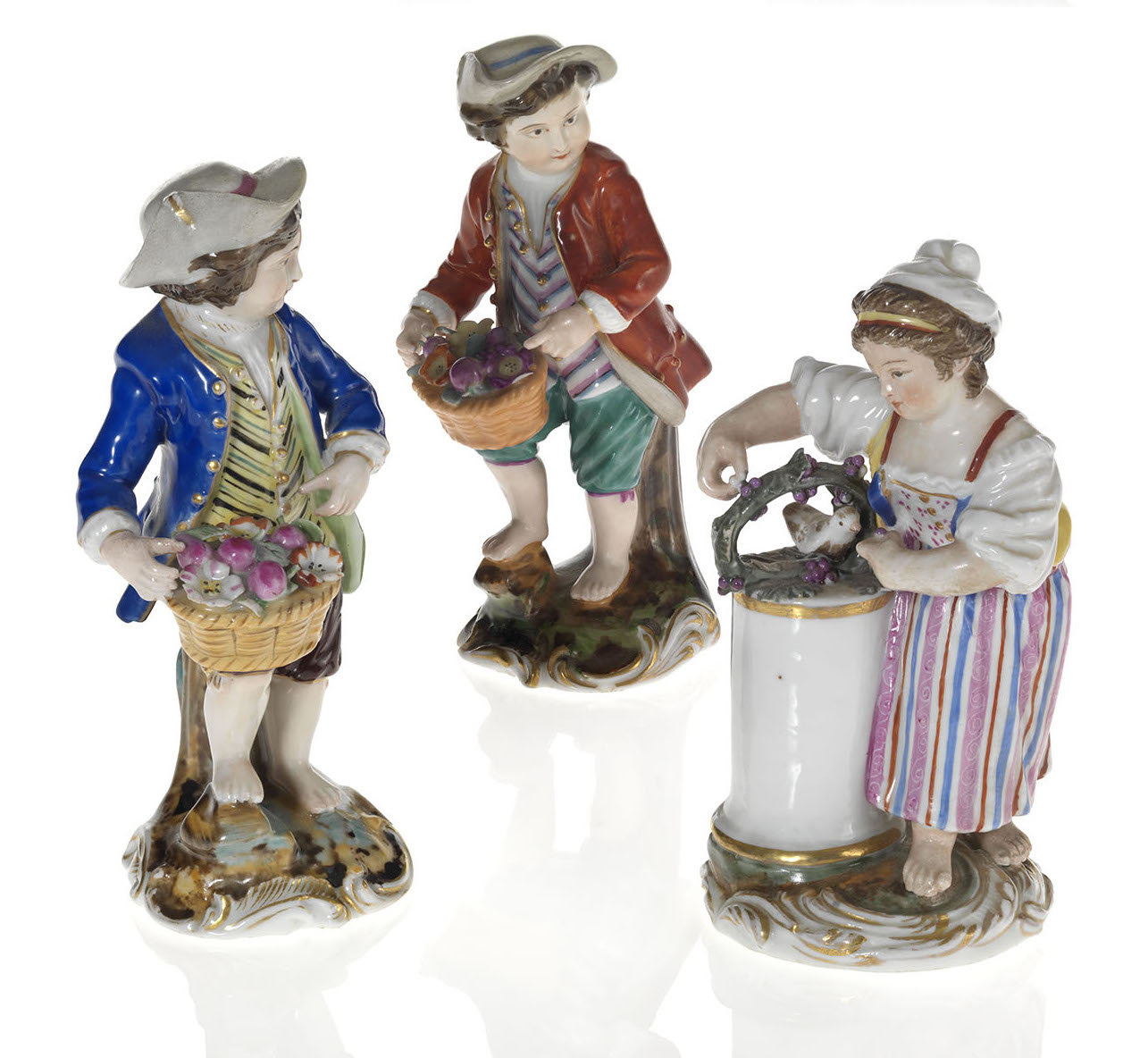 Three Porcelain Figurines of Children Gardeners