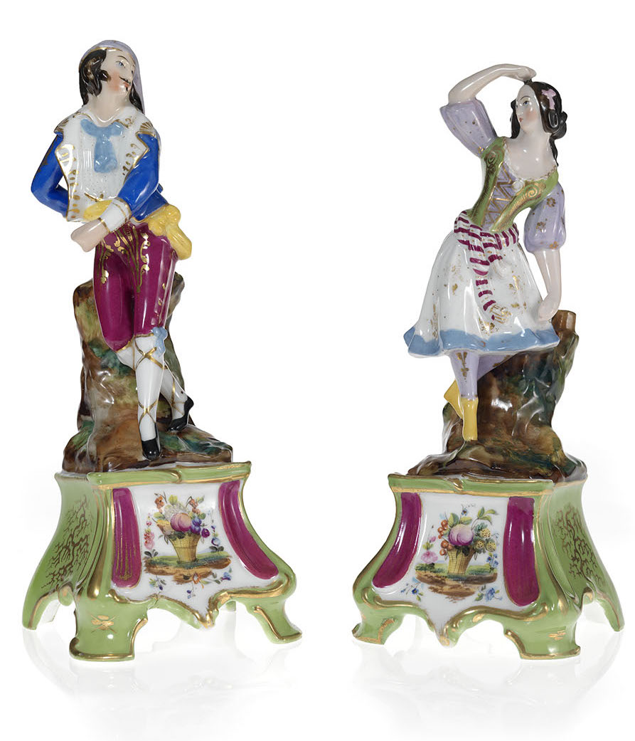 A Pair of Figurines of a Young Couple Dancing