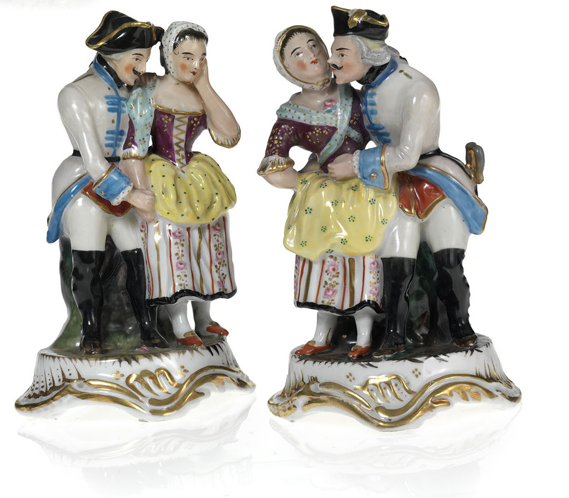 A Pair of Porcelain Figurines of Two Couples