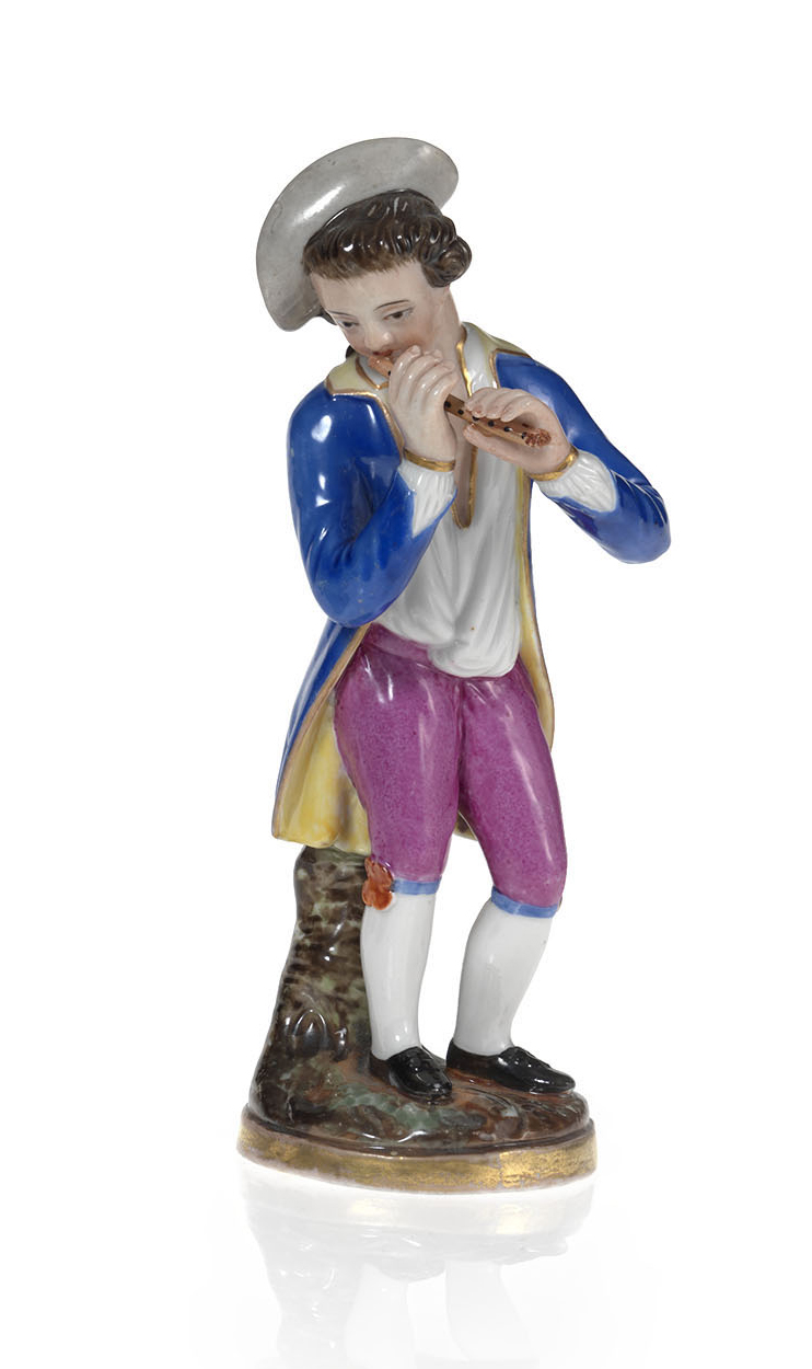 A Porcelain Figurine of a Flautist