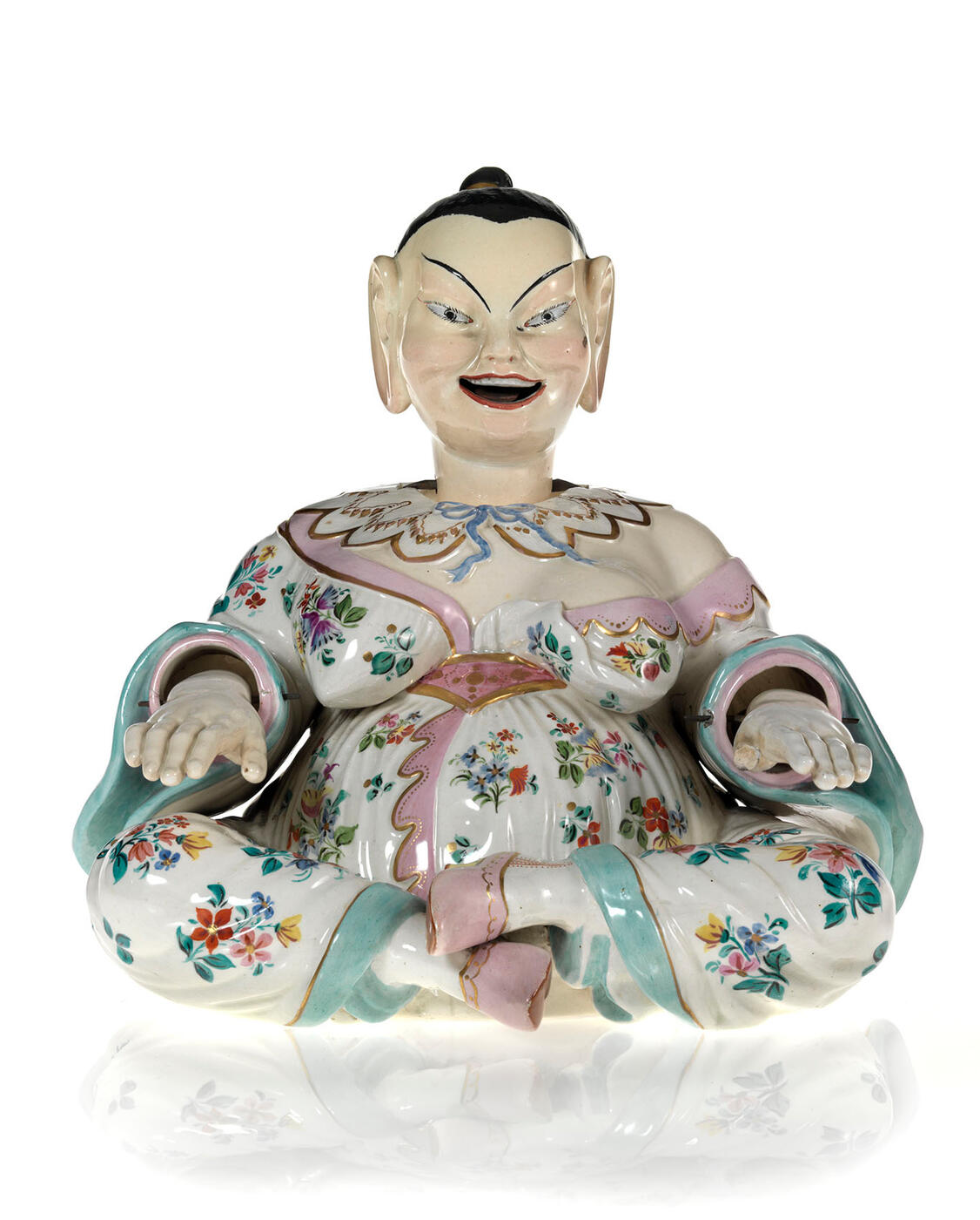 An Articulated Faience Figurine of a Buddha