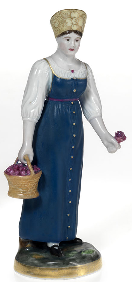 A Porcelain Figurine of a Cherry Gatherer