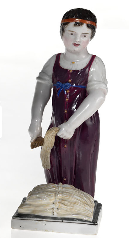 A Porcelain Figurine of a Young Girl Carding Wool