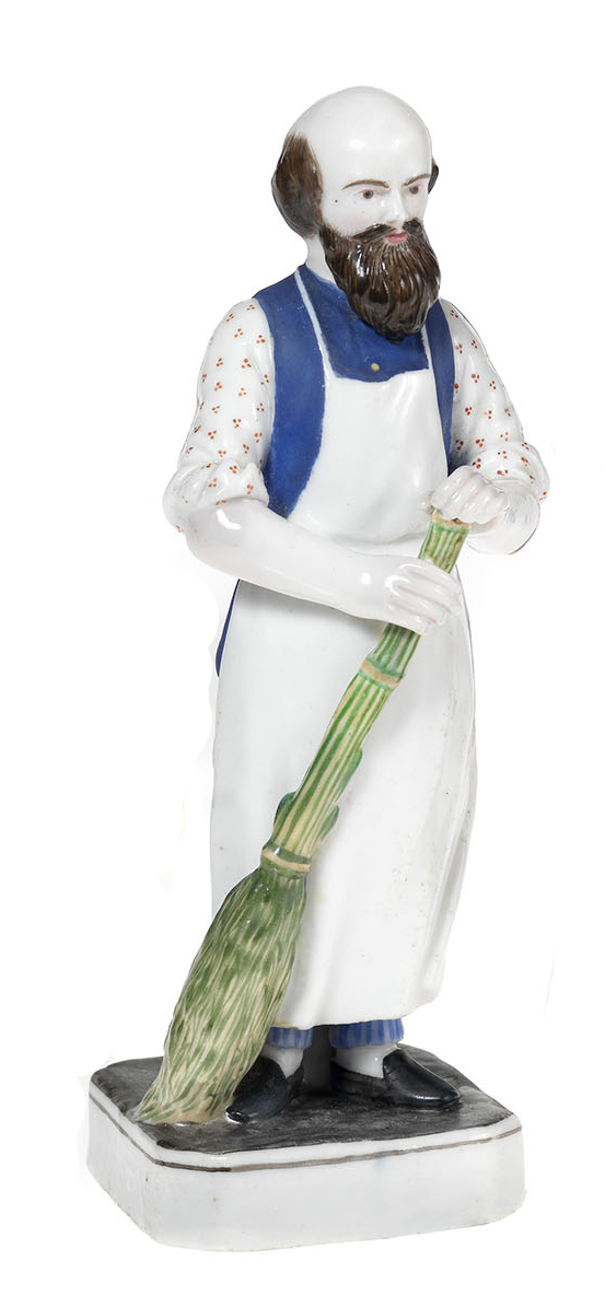 A Porcelain Figurine of a Sweeper