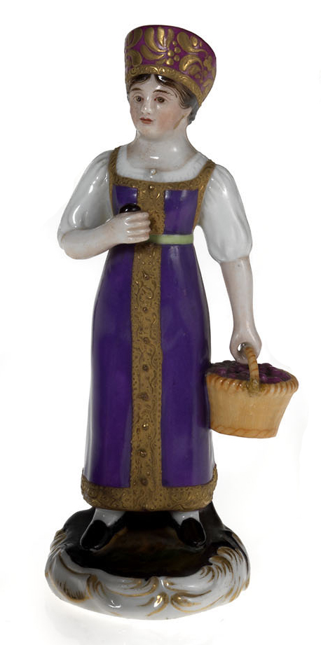 A Miniature Porcelain Figurine of a Berry Gatherer