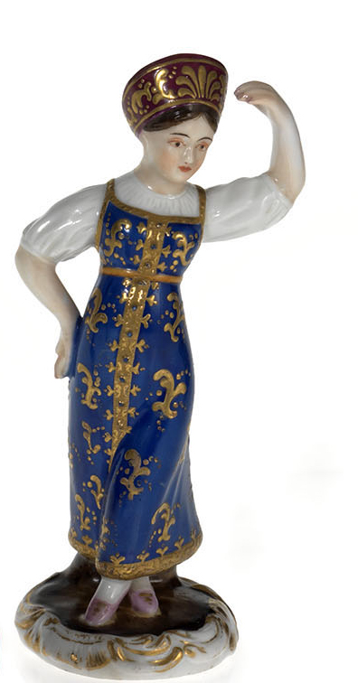 A Miniature Porcelain Figurine of a Dancing Peasant