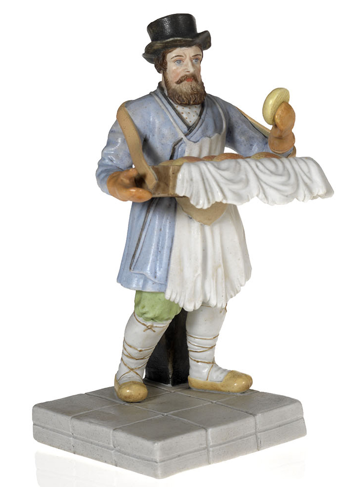 A Biscuit Porcelain Figurine of a Bread Vendor