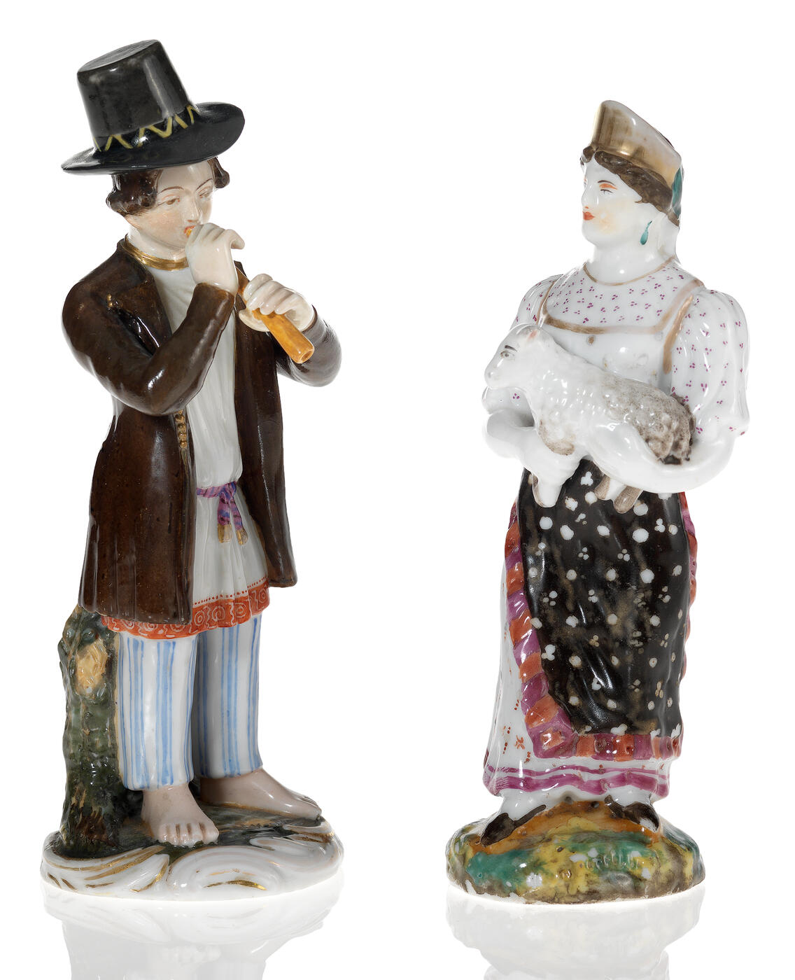 Two Porcelain Figurines of a Peasant Girl with a Lamb and a Shepherd Boy
