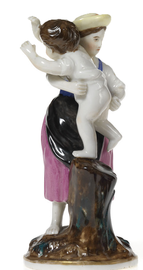 A Porcelain Figurine of a Woman Punishing Her Child