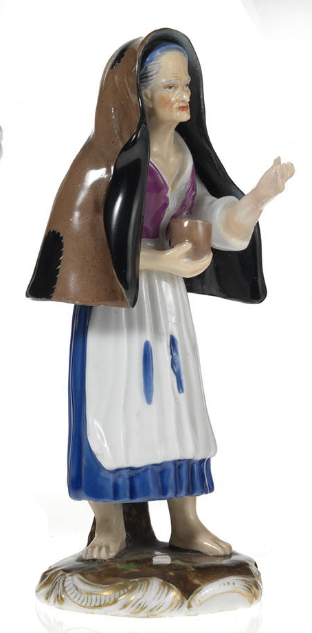 A Porcelain Figurine of a Beggar Woman