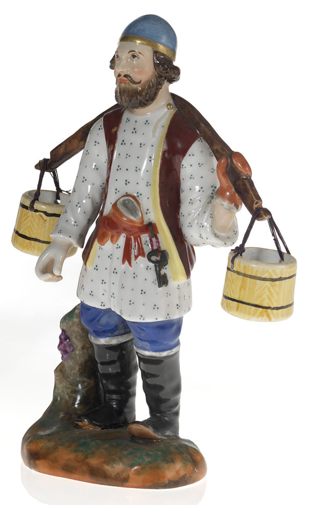 A Porcelain Figurine of a Water Carrier