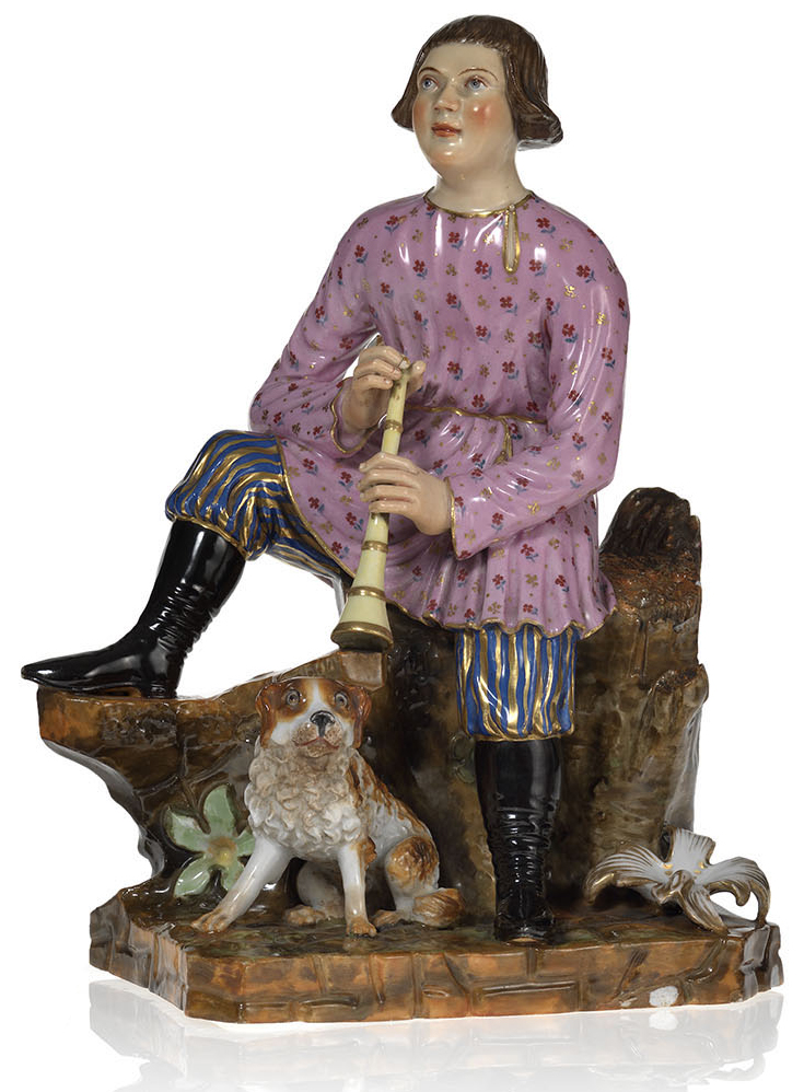 A Porcelain Figurine of a Shepherd Boy Playing His Reed