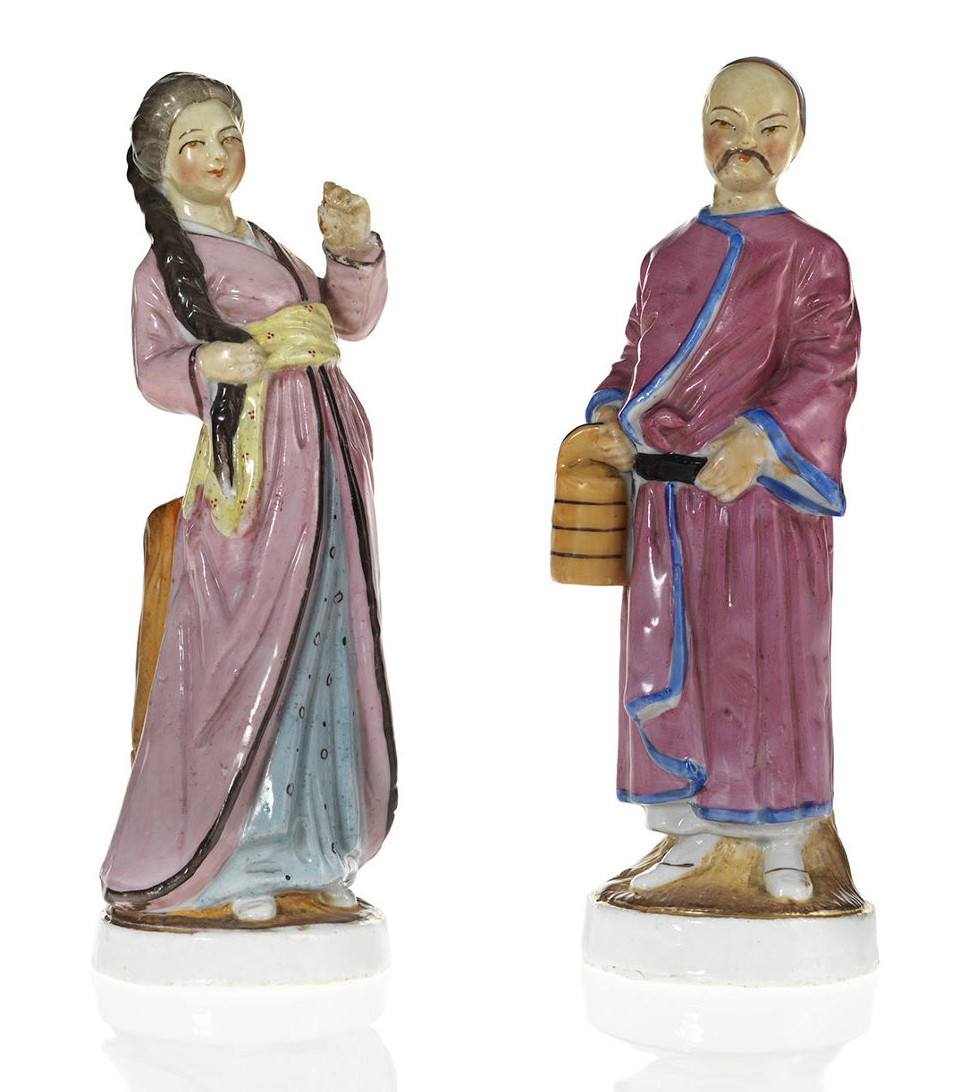 Two Porcelain Figurines of People from the East