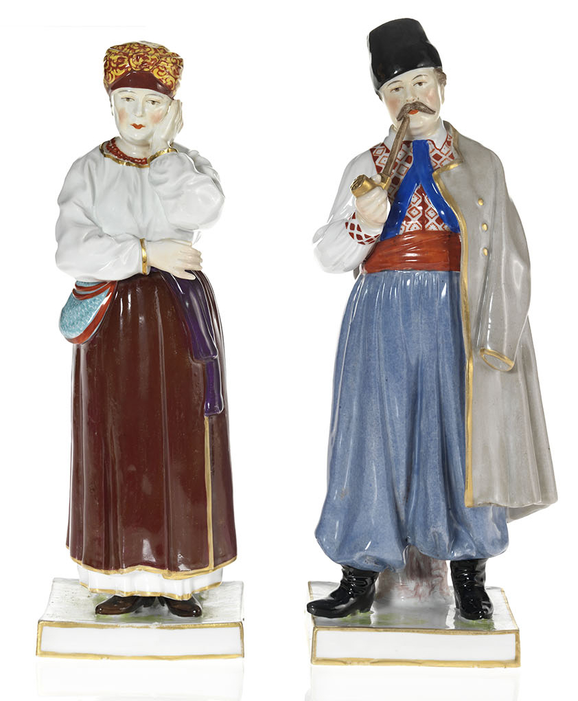 A Pair of Porcelain Figurines of Ukrainian Peasants