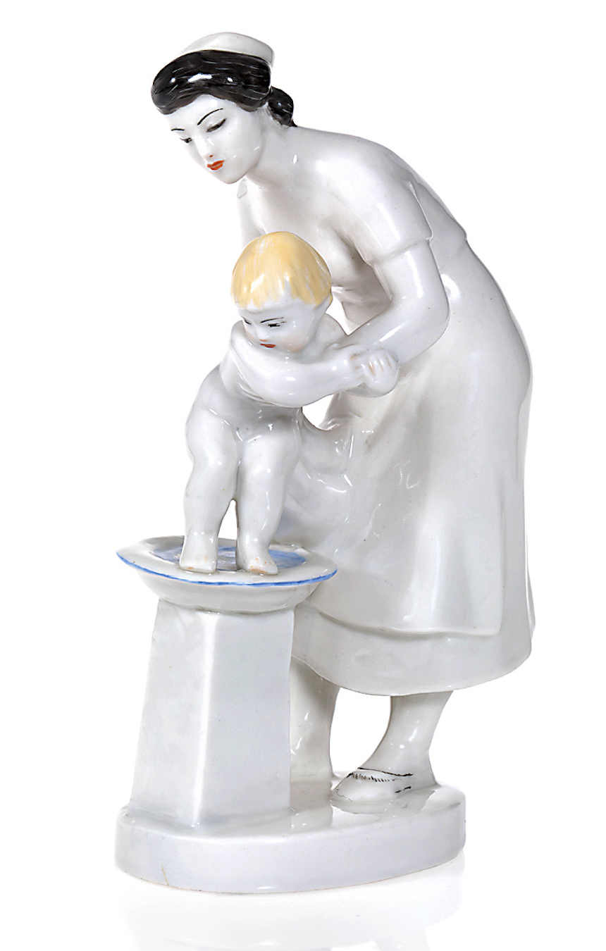 A Rare Soviet Porcelain Composition of a Mother Bathing Her Child
