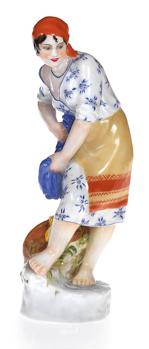 A Soviet Porcelain Figurine of a Washer Woman