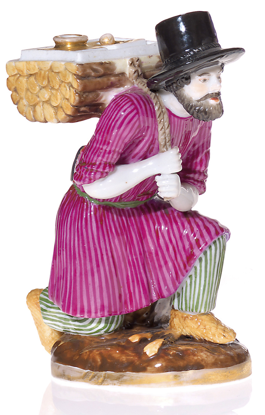 A Russian Porcelain Ink Set in the Form of a Lumberjack