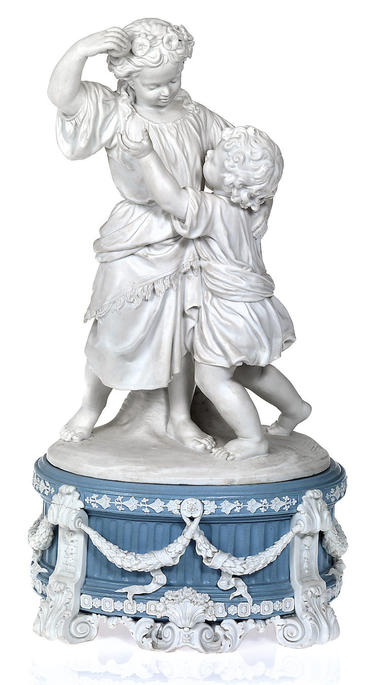 A Russian Biscuit Porcelain Composition of Children Playing