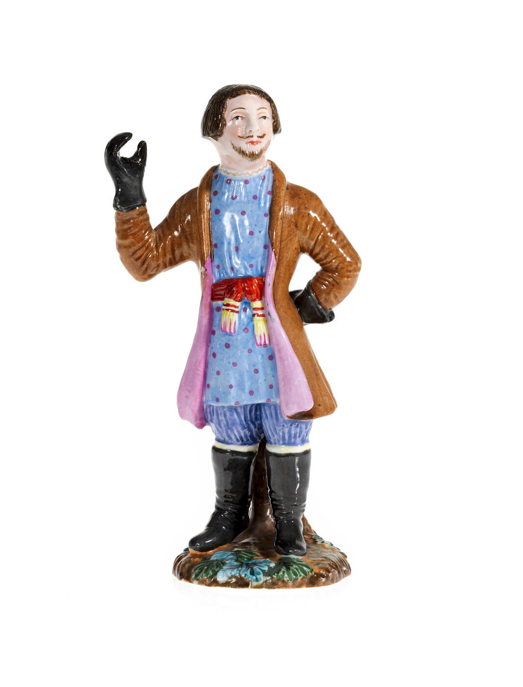 A Porcelain Figurine of a Peasant Man Dancing