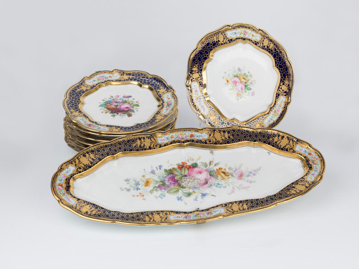 A Set of Seven Dinner Plates and a Fish Dish from the Sèvres Service