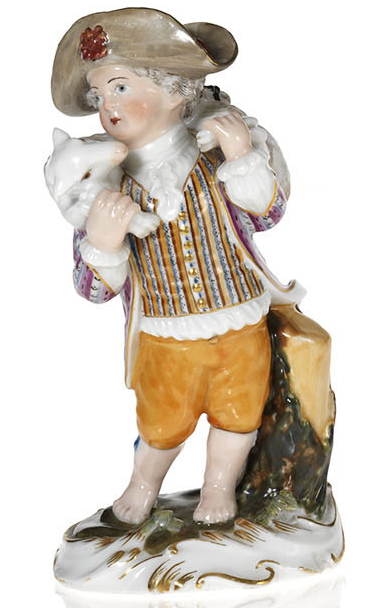 A Porcelain Figurine of a Boy in an 18th Century Dress with a Lamb