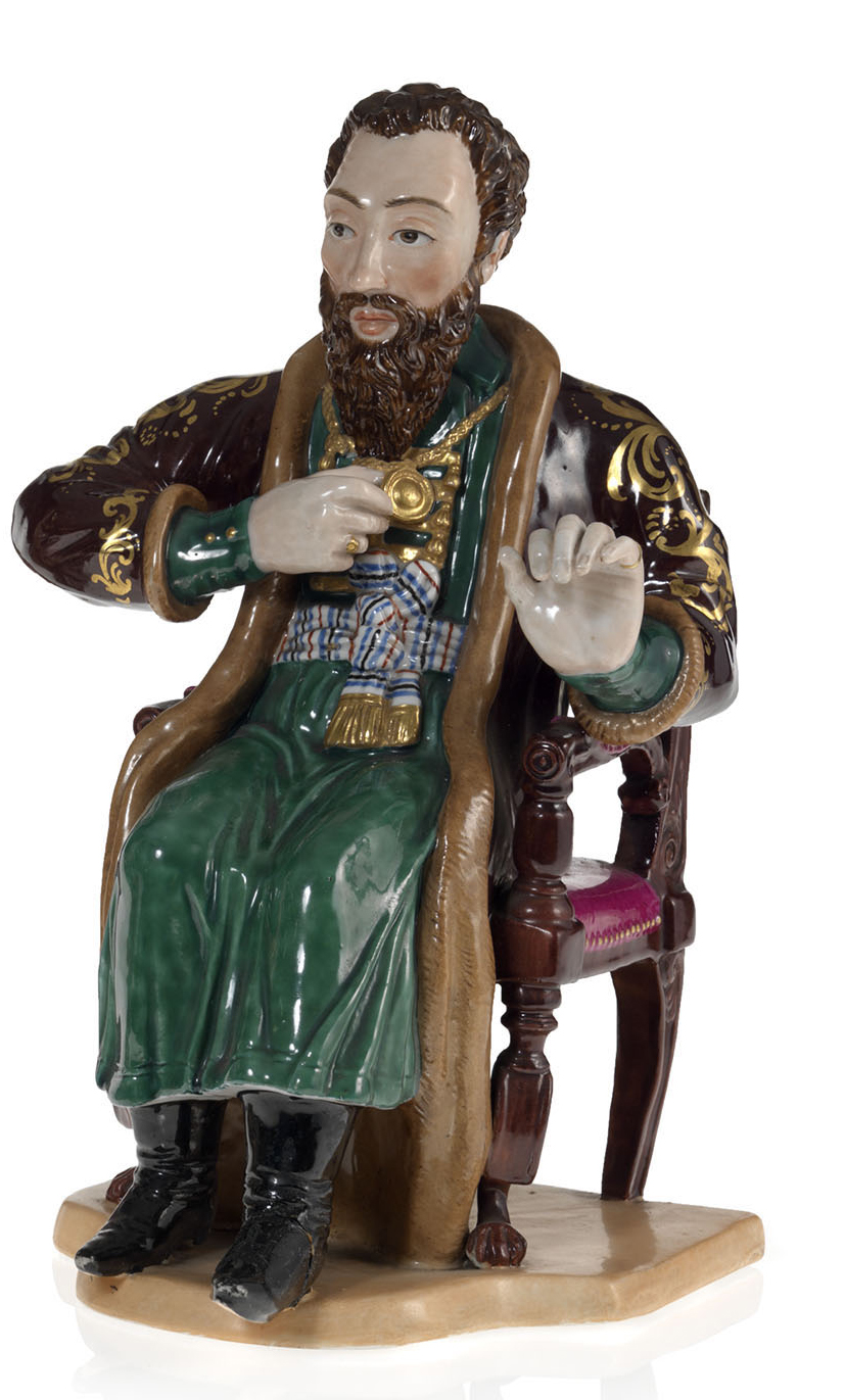 A Rare Large Porcelain Figurine of a Draughts Player