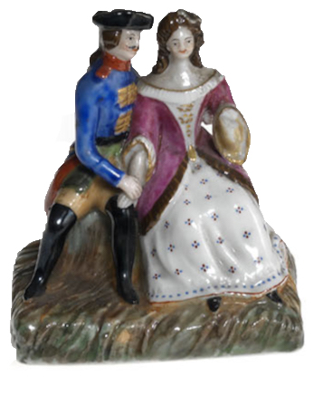 A Miniature Porcelain Figurine of a Couple