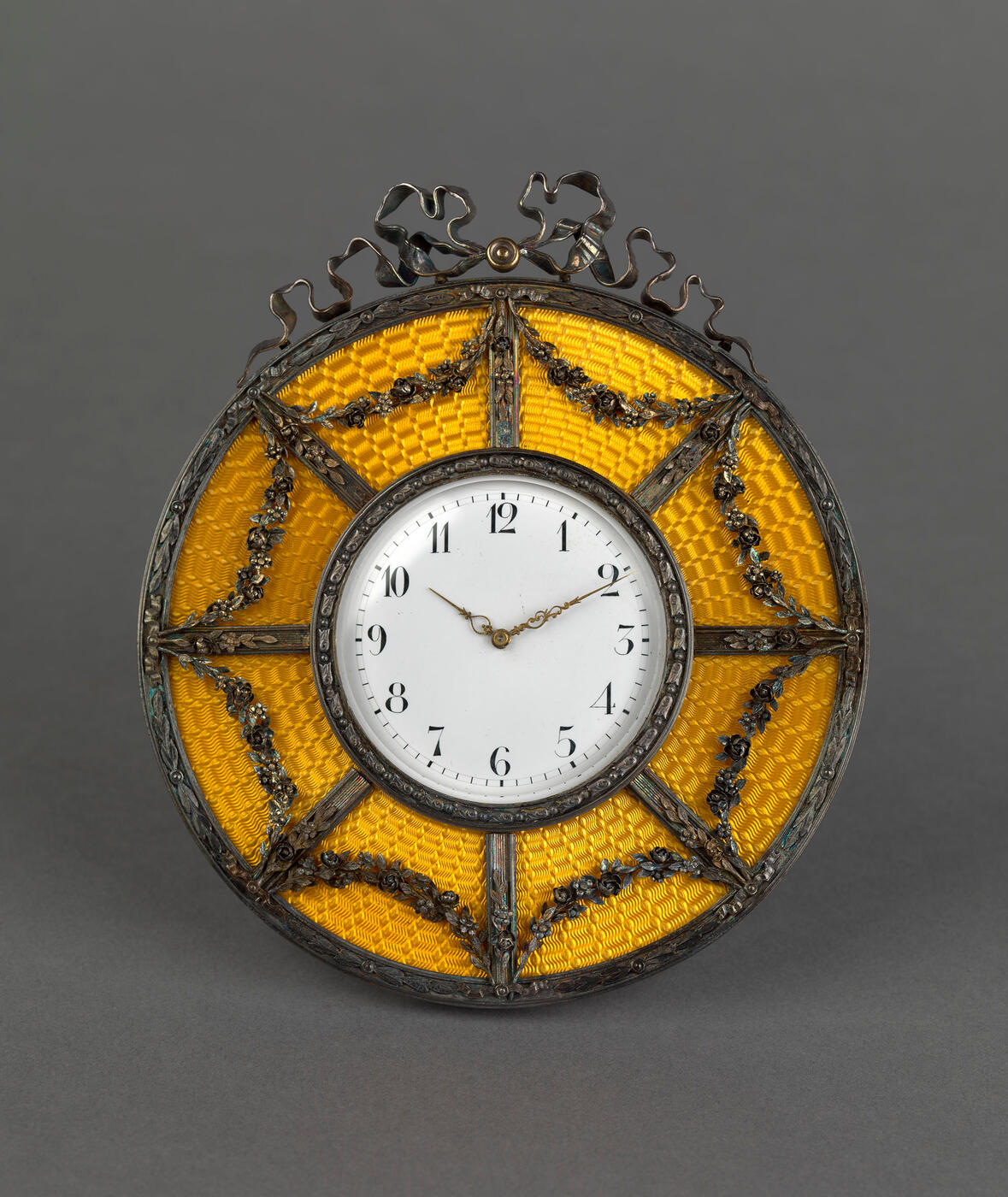 A SILVER-GILT AND YELLOW GUILLOCHÉ ENAMEL DESK CLOCK