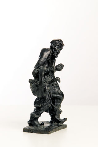 A Bronze Figure of a Man with Geese