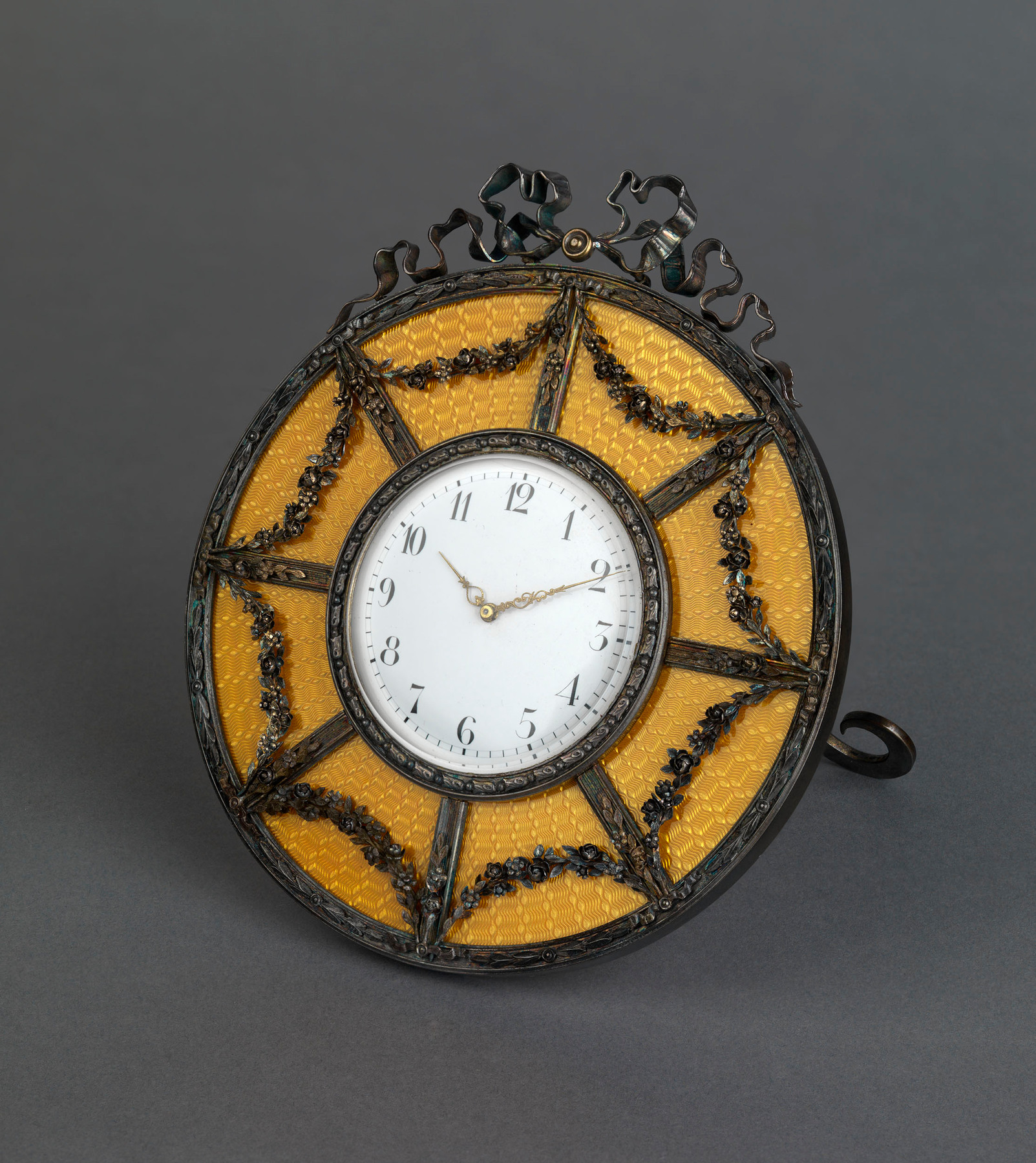 A SILVER-GILT AND YELLOW GUILLOCHÉ ENAMEL DESK CLOCK