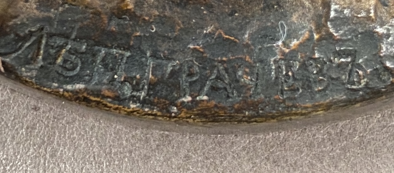 A Bronze Group of an Aleutian Woman Feeding Dogs.